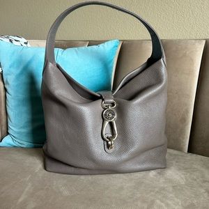 Dooney and Bourke Pebble Grain Leather Logo Lock Shoulder Bag in Taupe